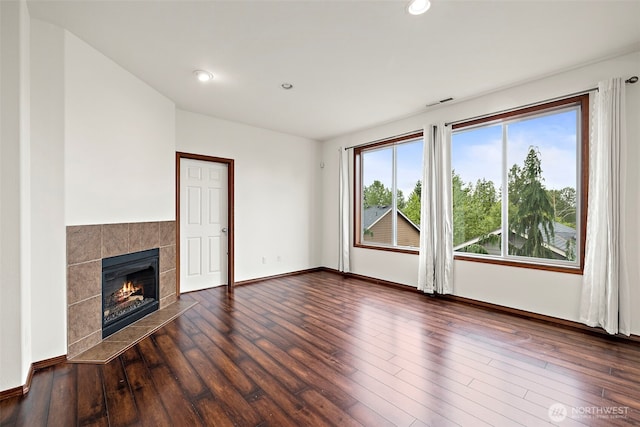 22820 41st Dr SE, Bothell, WA 98021 - unfurnished living room featuring wood finished floors, a tiled fireplace, and recessed lighting