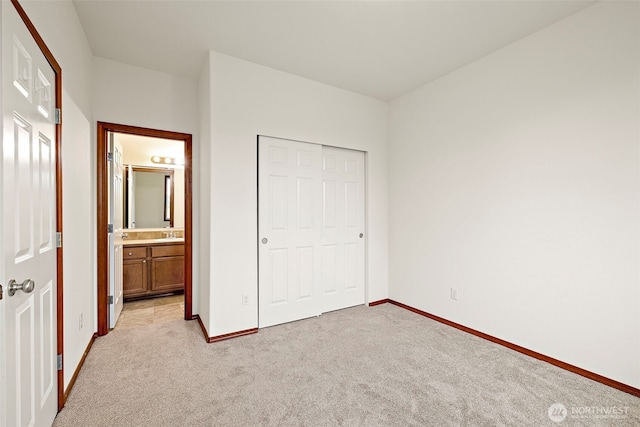 22820 41st Dr SE, Bothell, WA 98021 - unfurnished bedroom with light colored carpet, a closet, and ensuite bath