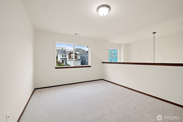 22820 41st Dr SE, Bothell, WA 98021 - spare room featuring carpet flooring and baseboards