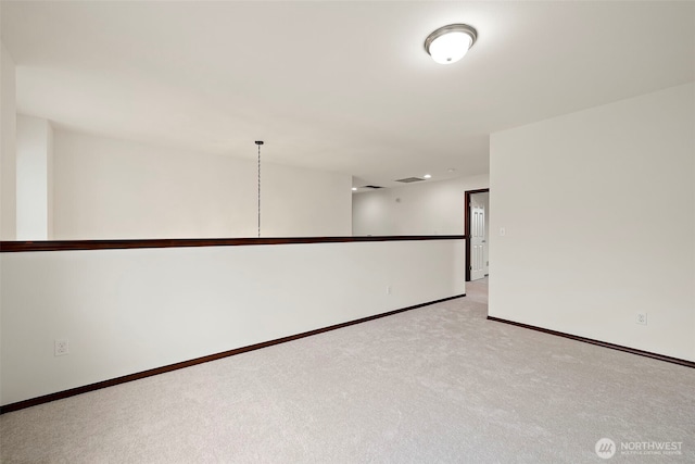 22820 41st Dr SE, Bothell, WA 98021 - unfurnished room featuring light colored carpet and baseboards