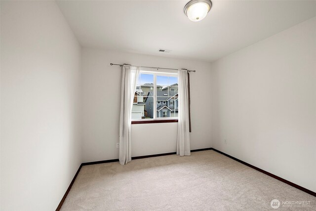 22820 41st Dr SE, Bothell, WA 98021 - empty room featuring light carpet and baseboards