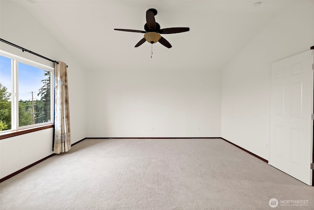 22820 41st Dr SE, Bothell, WA 98021 - empty room with light colored carpet, ceiling fan, and lofted ceiling