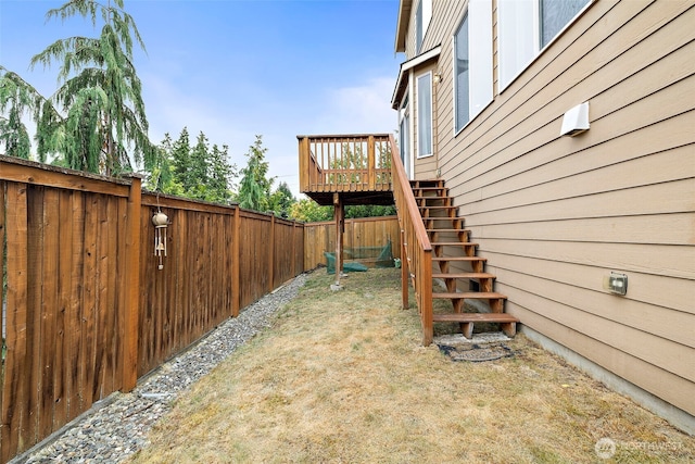 22820 41st Dr SE, Bothell, WA 98021 - fenced backyard featuring stairs and a wooden deck