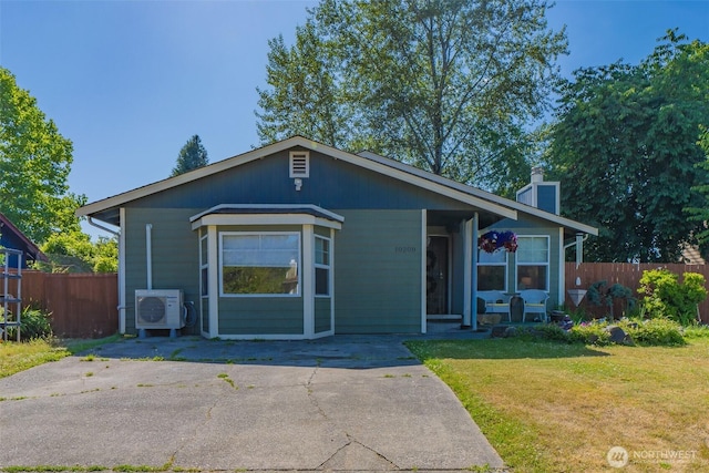 10208 D St E, Tacoma, WA 98445 - view of front of home with a chimney