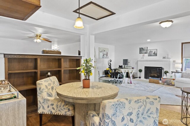 10208 D St E, Tacoma, WA 98445 - dining room with a brick fireplace and a ceiling fan