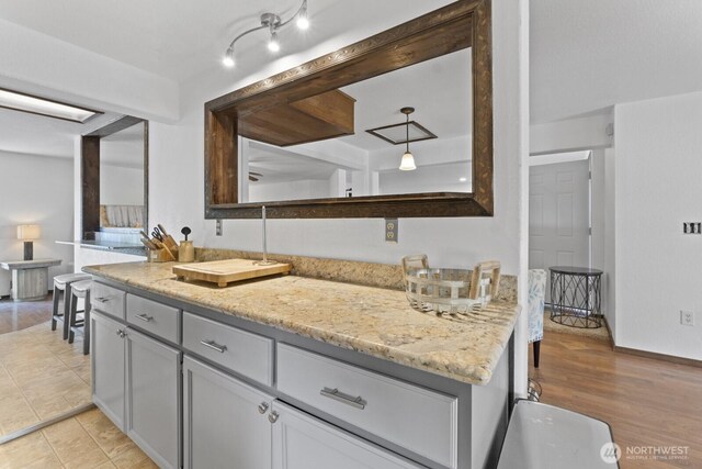 10208 D St E, Tacoma, WA 98445 - bathroom featuring vanity and wood finished floors