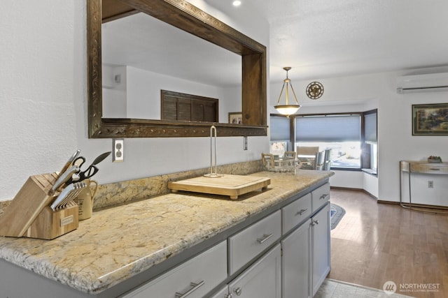 10208 D St E, Tacoma, WA 98445 - bathroom with a wall mounted air conditioner and wood finished floors