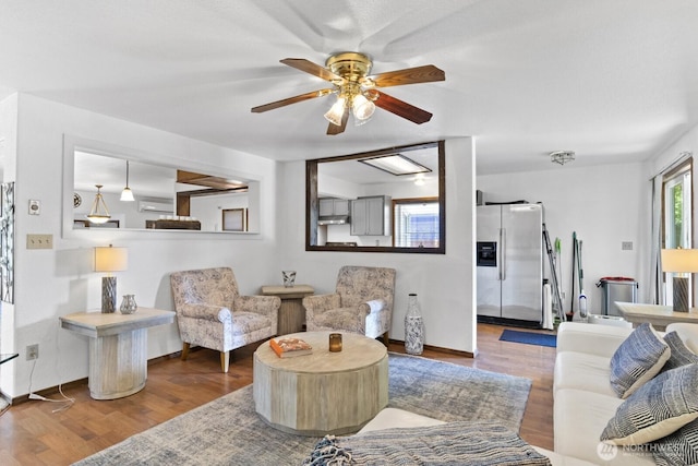 10208 D St E, Tacoma, WA 98445 - living area featuring a ceiling fan, wood finished floors, and a wall unit AC