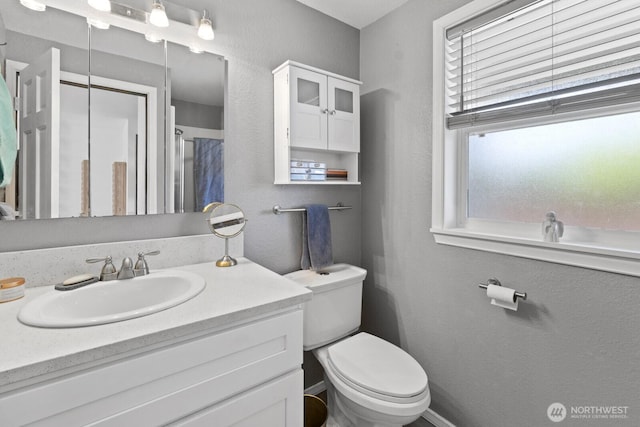 10208 D St E, Tacoma, WA 98445 - bathroom featuring toilet and vanity
