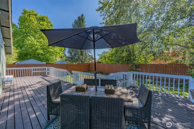 10208 D St E, Tacoma, WA 98445 - deck with a fenced backyard, an outdoor living space, and outdoor dining area