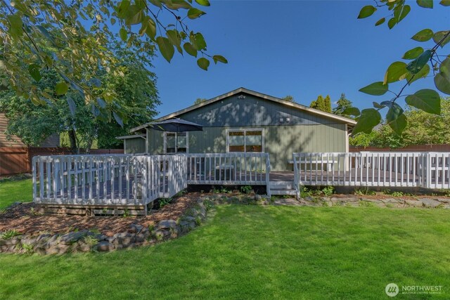 10208 D St E, Tacoma, WA 98445 - back of property featuring a wooden deck