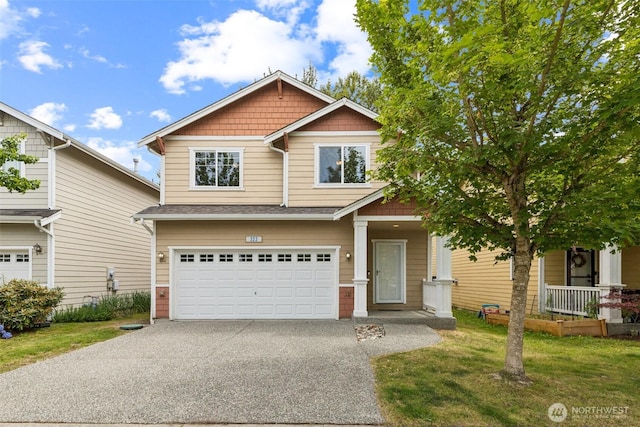 323 Helen St, Sedro Woolley, WA 98284 - craftsman-style home featuring a garage, asphalt driveway, and a front yard
