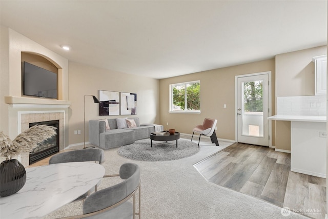 323 Helen St, Sedro Woolley, WA 98284 - living area featuring a tile fireplace, wood finished floors, and recessed lighting