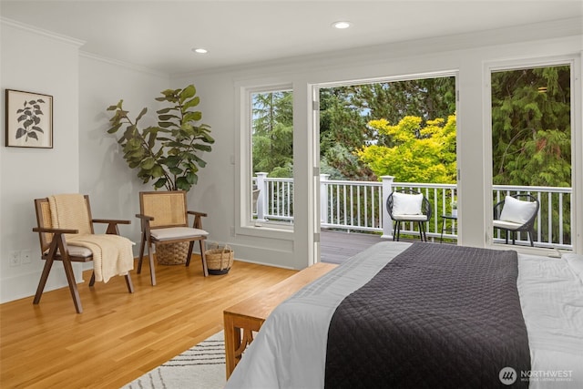 3204 Evergreen Point Rd, Medina, WA 98039 - bedroom with access to exterior, wood finished floors, ornamental molding, and recessed lighting