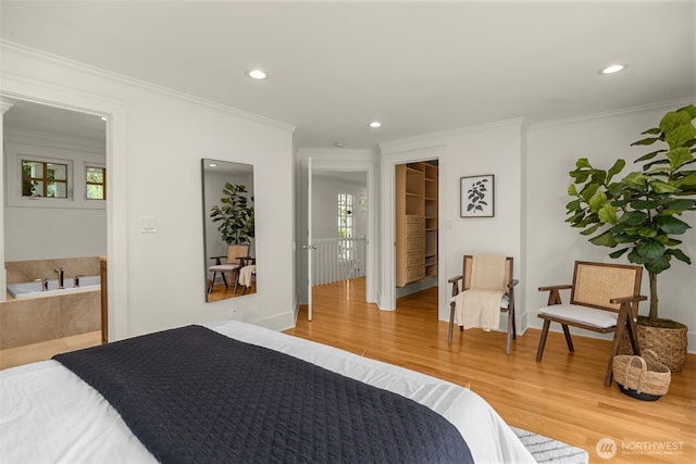 3204 Evergreen Point Rd, Medina, WA 98039 - bedroom featuring ornamental molding, light wood-style floors, and recessed lighting