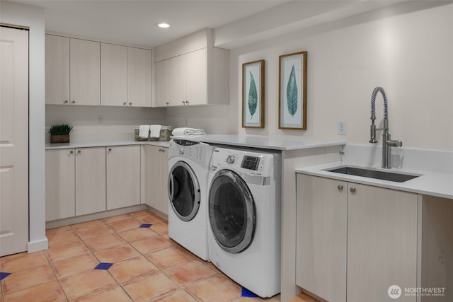 3204 Evergreen Point Rd, Medina, WA 98039 - laundry area with washer and dryer, cabinet space, recessed lighting, and light tile patterned floors