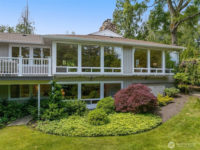3204 Evergreen Point Rd, Medina, WA 98039 - back of house with a chimney and board and batten siding