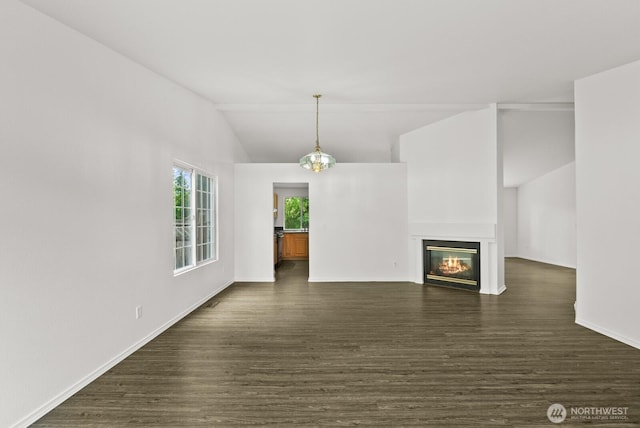 4327 Cedar Ct SE, Lacey, WA 98503 - unfurnished living room with dark wood-style floors, lofted ceiling, and a glass covered fireplace