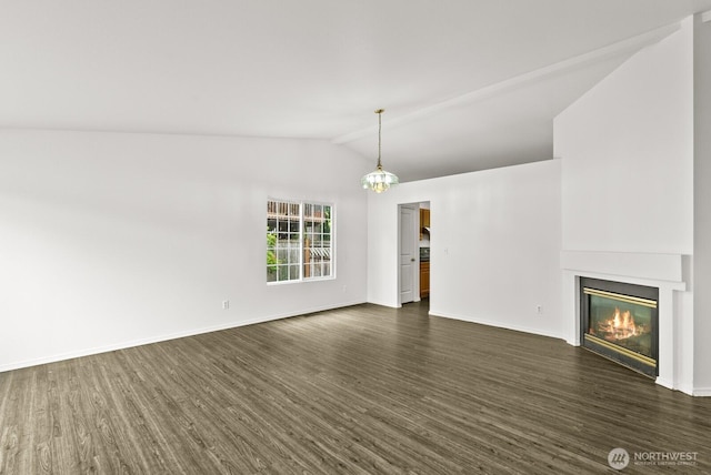 4327 Cedar Ct SE, Lacey, WA 98503 - unfurnished living room featuring dark wood-style flooring, vaulted ceiling, and a glass covered fireplace