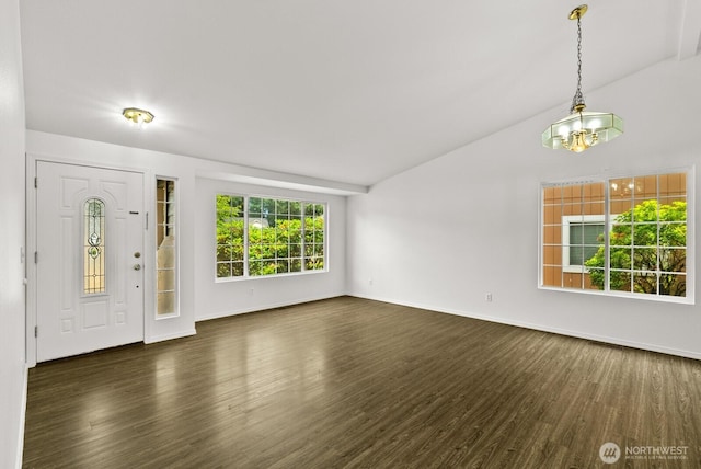 4327 Cedar Ct SE, Lacey, WA 98503 - entrance foyer featuring dark wood finished floors, vaulted ceiling, and a chandelier