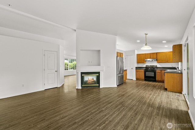 4327 Cedar Ct SE, Lacey, WA 98503 - unfurnished living room with dark wood-style floors, recessed lighting, and a glass covered fireplace