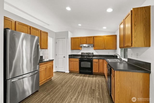 4327 Cedar Ct SE, Lacey, WA 98503 - kitchen featuring black appliances, under cabinet range hood, dark countertops, brown cabinetry, and dark wood-style flooring