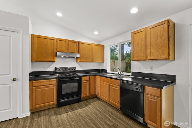 4327 Cedar Ct SE, Lacey, WA 98503 - kitchen featuring black appliances, under cabinet range hood, dark wood finished floors, lofted ceiling, and dark countertops