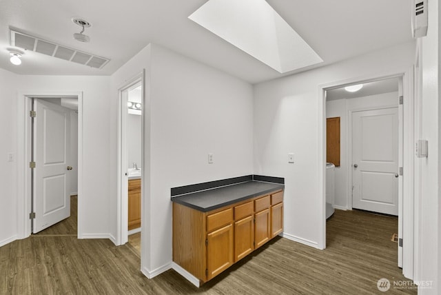 4327 Cedar Ct SE, Lacey, WA 98503 - bar featuring wood finished floors and a skylight