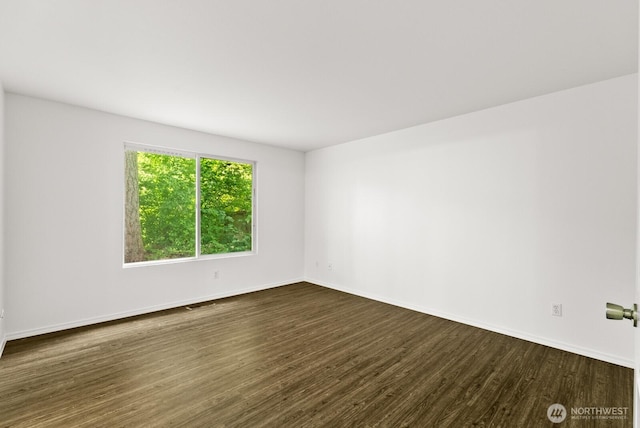 4327 Cedar Ct SE, Lacey, WA 98503 - spare room with dark wood-style floors and baseboards
