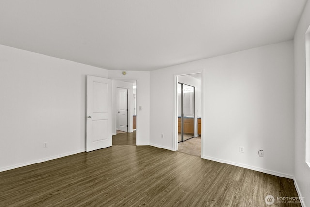 4327 Cedar Ct SE, Lacey, WA 98503 - empty room with dark wood-type flooring and baseboards