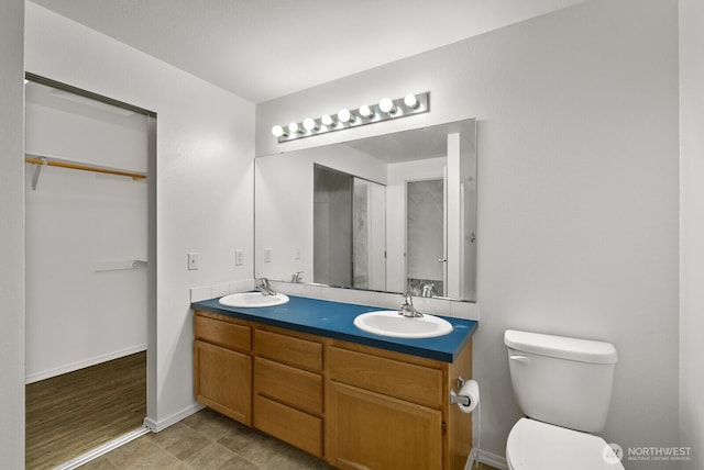 4327 Cedar Ct SE, Lacey, WA 98503 - bathroom with double vanity and toilet