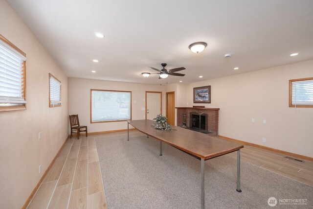 225 Basin St SW, Ephrata, WA 98823 - office space with ceiling fan, a brick fireplace, wood tiled floors, and recessed lighting
