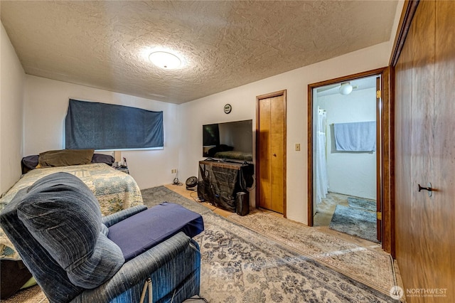 161 Lupine Dr, Sequim, WA 98382 - carpeted bedroom featuring a textured ceiling