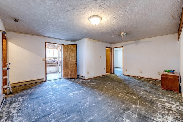 161 Lupine Dr, Sequim, WA 98382 - empty room featuring a baseboard radiator, ceiling fan, and a textured ceiling