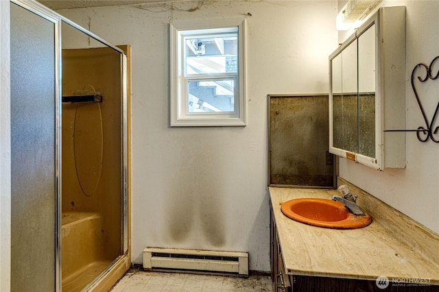 161 Lupine Dr, Sequim, WA 98382 - full bathroom featuring a baseboard heating unit, vanity, and a shower stall
