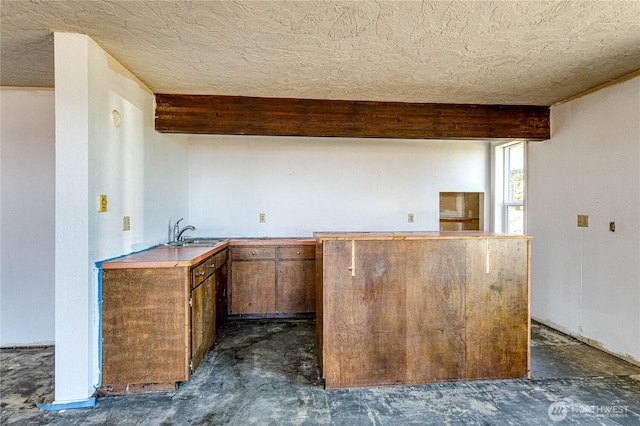 161 Lupine Dr, Sequim, WA 98382 - kitchen with concrete floors and a textured ceiling