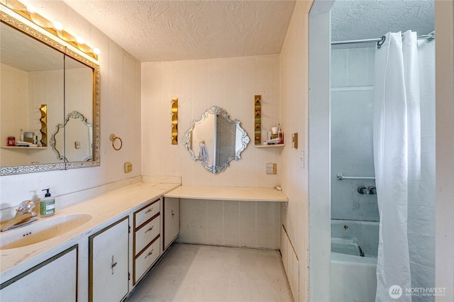 161 Lupine Dr, Sequim, WA 98382 - bathroom featuring vanity, a textured ceiling, concrete floors, and shower / bath combo with shower curtain