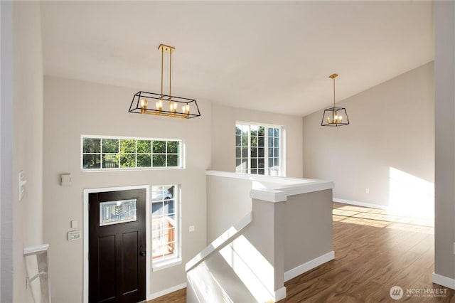 5814 Braywood Ln SE, Olympia, WA 98513 - foyer featuring a chandelier, wood finished floors, and lofted ceiling