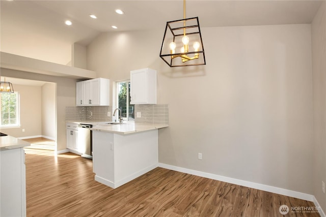 5814 Braywood Ln SE, Olympia, WA 98513 - kitchen featuring a chandelier, healthy amount of natural light, white cabinets, recessed lighting, and vaulted ceiling