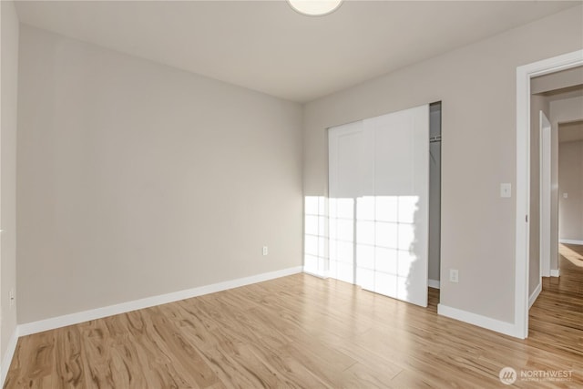 5814 Braywood Ln SE, Olympia, WA 98513 - unfurnished bedroom featuring light wood finished floors and a closet