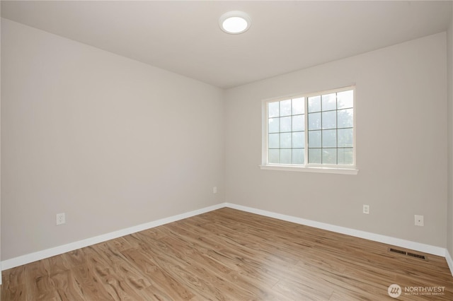 5814 Braywood Ln SE, Olympia, WA 98513 - unfurnished room featuring light wood-style flooring and baseboards