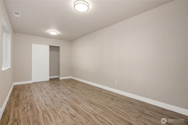 5814 Braywood Ln SE, Olympia, WA 98513 - empty room with light wood-style flooring and baseboards