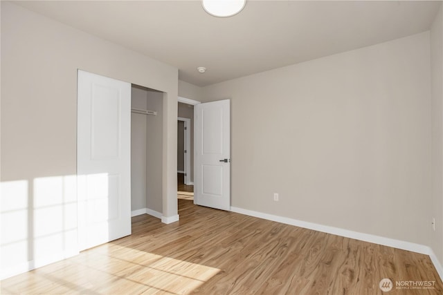 5814 Braywood Ln SE, Olympia, WA 98513 - unfurnished bedroom featuring light wood-style flooring and a closet