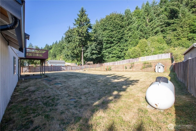 5814 Braywood Ln SE, Olympia, WA 98513 - fenced backyard with a storage shed and a wooded view