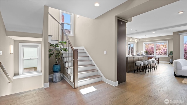 1006 4th St W, Kirkland, WA 98033 - stairway featuring wood finished floors and recessed lighting