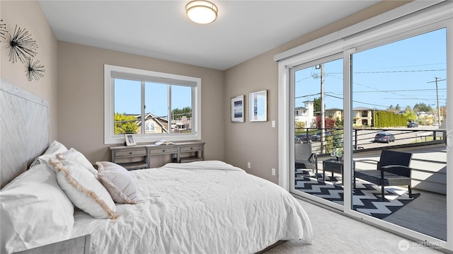 1006 4th St W, Kirkland, WA 98033 - carpeted bedroom with access to outside and multiple windows