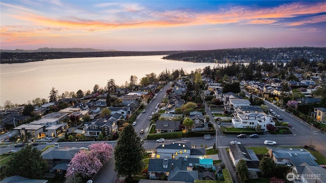 1006 4th St W, Kirkland, WA 98033 - aerial view at dusk of a residential view and a water view