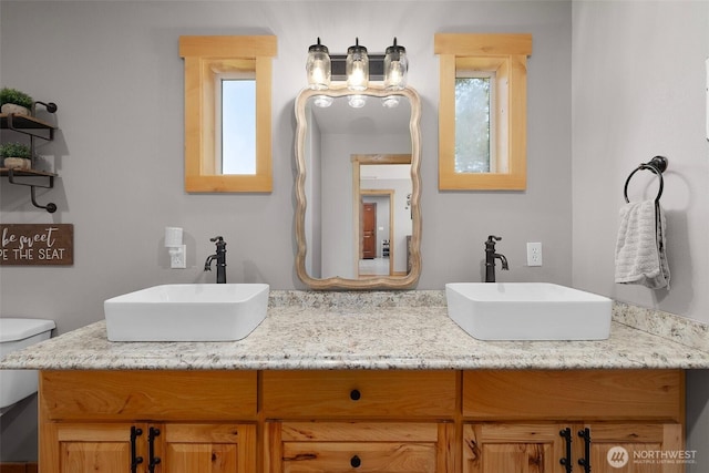 3146 State Route 508, Onalaska, WA 98570 - bathroom featuring double vanity and toilet