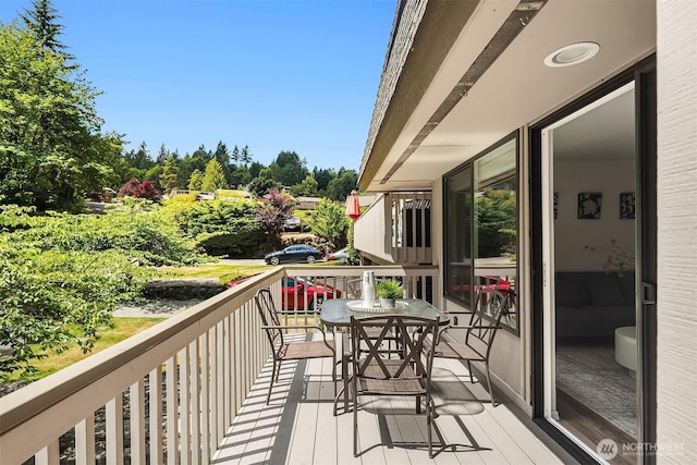 16932 NE 2nd Pl, Bellevue, WA 98008 - balcony featuring view of wooded area