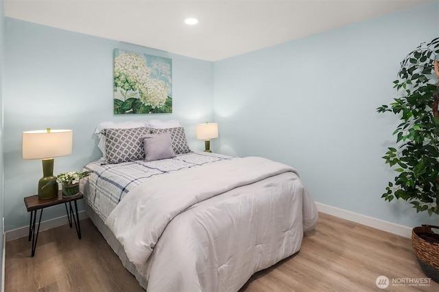 16932 NE 2nd Pl, Bellevue, WA 98008 - bedroom with wood finished floors and recessed lighting